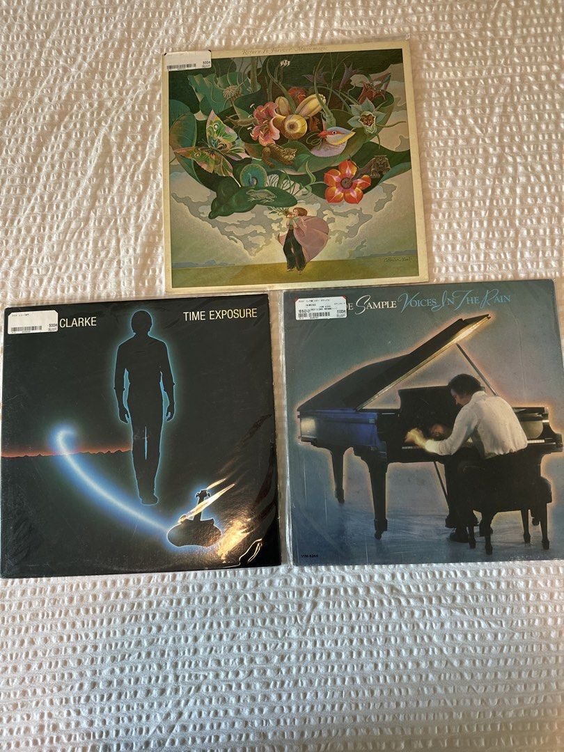 Stanley Clarke, Time Exposure & More Vinyl Records (Category: Vinyls) located in Manila. Submitted by el_decluttering (Listing ID 1446428859, Image 1). Description: 1k per piece - Three vinyl records for sale. - Includes Stanley Clarke's 'Time Exposure'. - Also features 'Voices of the Rain' by Sample. - Great additions for any vinyl collector. LOCATION: MAKATI.
