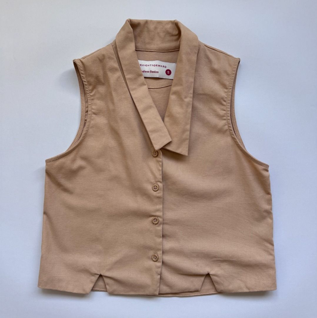 STRAIGHTFORWARD Boundless Basics Sleeveless Vest Size S (Category: Sleeveless) located in Naga. Submitted by billysstuff (Listing ID 1446468676, Image 1). Description: - Sleeveless vest from Straightforward - Part of the Boundless Basics collection - Collared neckline - Button-up front - Cropped fit - Split hem details - Ideal for layering.