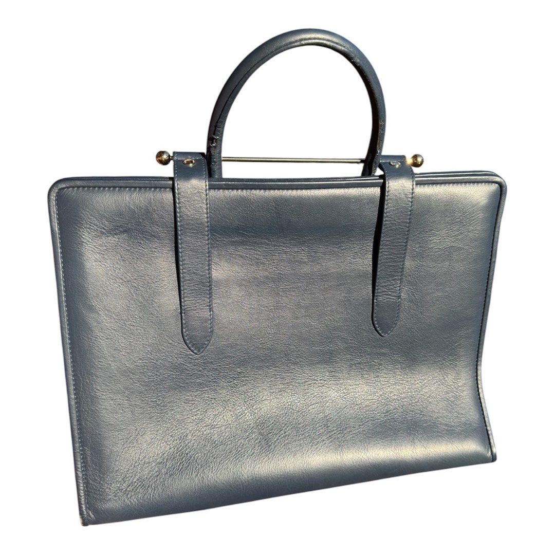 STRATHBERRY Leather Top Handle Bag (Category: Luxury Bags & Wallets) located in Lingayen. Submitted by lux_thrift (Listing ID 1446535665, Image 3). Description: SALE!!!! location pangasinan approximately 14.5 x 11 inches missing strap bawal po sa ngiinarte minor rubs and minor issue on rubber lining amoy bago dark blue color may vary due to lighting .