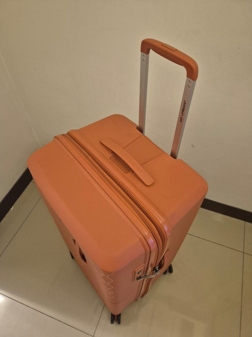 The Urban Trunk Luggage - Orange (Category: Luggage) located in Manila. Submitted by _mlb94 (Listing ID 1446442600, Image 2). Description: The Urban Luggage – Orange Expandable Spinner Trunk Type Suitcase Premium luggage in excellent condition. Size: Large (L) Approx. Dimensions: 78 × 38 × 43 cm Approx. Capacity: 115–125L (Expandable) Features: - Orange polycarbonate exterior - Trunk Type Luggage - Expandable for extra packing capacity - TSA-appr