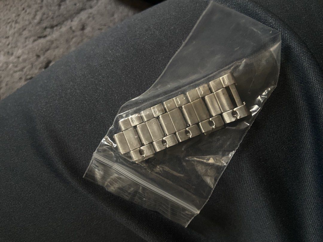 Titan Watch Workwear (Category: Watches) located in Petaling Jaya. Submitted by mer_111 (Listing ID 1446352840, Image 3). Description: - Titan Watch Model: NS1802SM03 - Strap: Silver metal - Includes: Extra links (in plastic bag) - Condition: Comes in original box - Use once. .