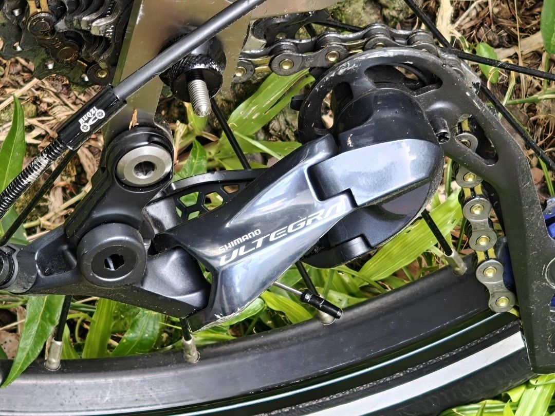 Titanium 'Brompton' (Category: Bicycles) located in Singapore. Submitted by kryptonit (Listing ID 1446351423, Image 3). Description: - Titanium frame in white 2k paint - Titanium Fork, Titanium Stem - Titanium Rear Triangle - Ultegra 9 Speed Shifters & Derailleur - 20 inch Wheelset with 11-48T Cogs - Continental Tyres - Carbon Crankset, Titanium BB - Ultralight Folding Pedals - Carbon M Handlebar - Litepro Carbon Seatpost - Ultralight Seat - Ultr
