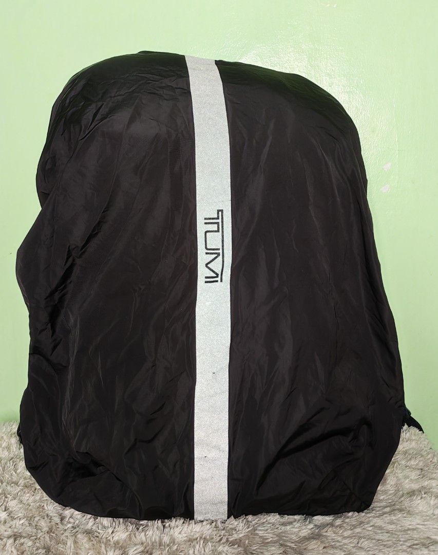 Tumi Tahoe Forest Backpack with Rain Cover (Category: Luxury Bags & Wallets) located in Iloilo. Submitted by blancroger_tumi (Listing ID 1446375107, Image 3). Description: - Tumi Tahoe Forest Flapbackpack - Multiple compartments for excellent organization - Includes original Tumi branded rain cover - Padded straps for maximum comfort during commutes or travel - Durable top leather handle & Nylon Materials - Smooth, high-quality zippers - In good,