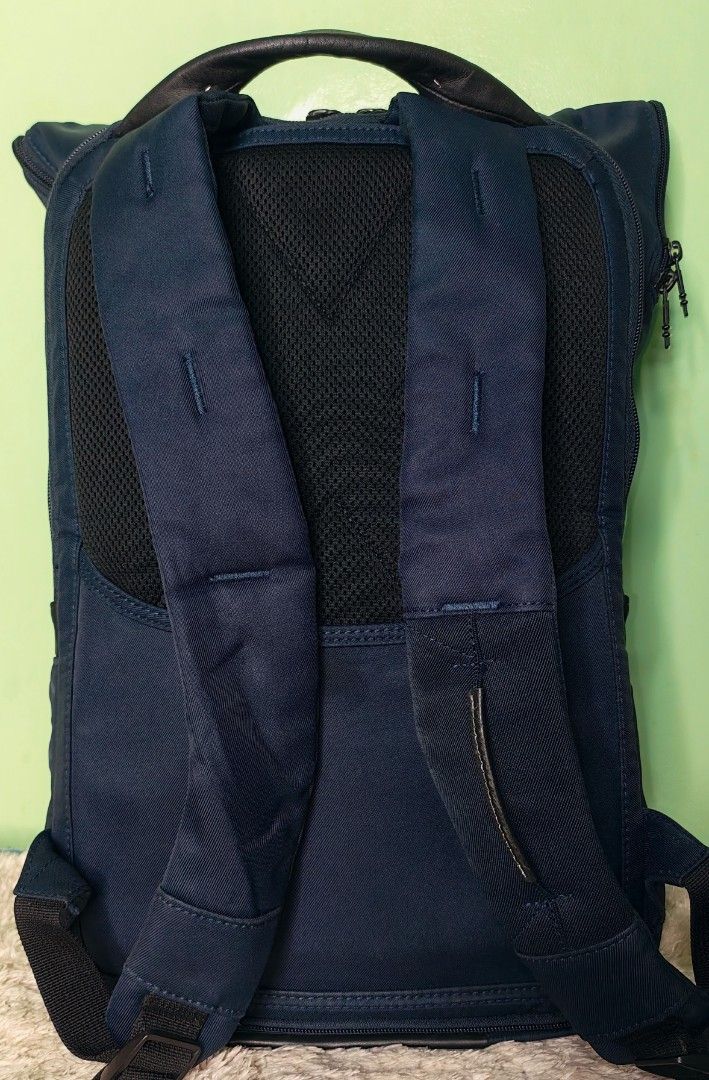 Tumi Tahoe Forest Backpack with Rain Cover (Category: Luxury Bags & Wallets) located in Iloilo. Submitted by blancroger_tumi (Listing ID 1446375107, Image 2). Description: - Tumi Tahoe Forest Flapbackpack - Multiple compartments for excellent organization - Includes original Tumi branded rain cover - Padded straps for maximum comfort during commutes or travel - Durable top leather handle & Nylon Materials - Smooth, high-quality zippers - In good,