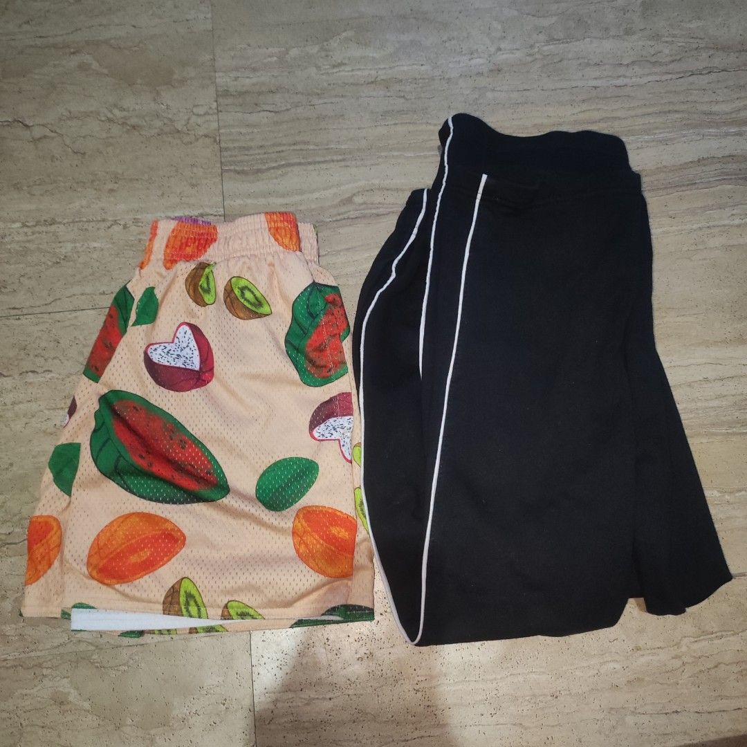 UND HGHMNDS Fruit Print & Black Shorts Set (Category: Shorts) located in Manila. Submitted by zenfalcon_46a66d (Listing ID 1446477311, Image 2). Description: - Set of 2 shorts - One pair features a fun all-over fruit print (watermelon, dragon fruit, kiwi, papaya) - Second pair is black with white piping - Both shorts have the UND HGHMNDS logo - Ideal for casual wear or sports activities Aspack 1200 Undxhghmnds pants (size S) Und Mesh short (size 