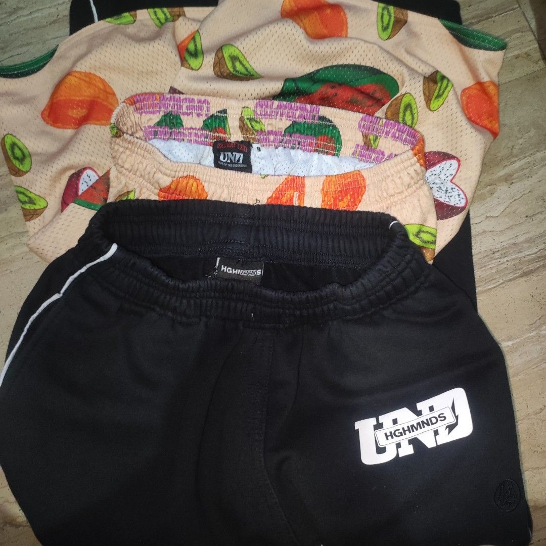 UND HGHMNDS Fruit Print & Black Shorts Set (Category: Shorts) located in Manila. Submitted by zenfalcon_46a66d (Listing ID 1446477311, Image 3). Description: - Set of 2 shorts - One pair features a fun all-over fruit print (watermelon, dragon fruit, kiwi, papaya) - Second pair is black with white piping - Both shorts have the UND HGHMNDS logo - Ideal for casual wear or sports activities Aspack 1200 Undxhghmnds pants (size S) Und Mesh short (size 