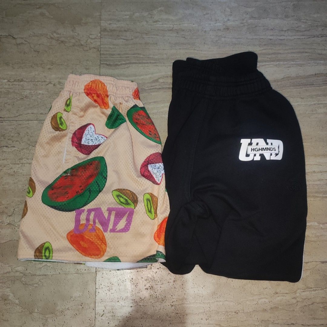 UND HGHMNDS Fruit Print & Black Shorts Set (Category: Shorts) located in Manila. Submitted by zenfalcon_46a66d (Listing ID 1446477311, Image 1). Description: - Set of 2 shorts - One pair features a fun all-over fruit print (watermelon, dragon fruit, kiwi, papaya) - Second pair is black with white piping - Both shorts have the UND HGHMNDS logo - Ideal for casual wear or sports activities Aspack 1200 Undxhghmnds pants (size S) Und Mesh short (size 