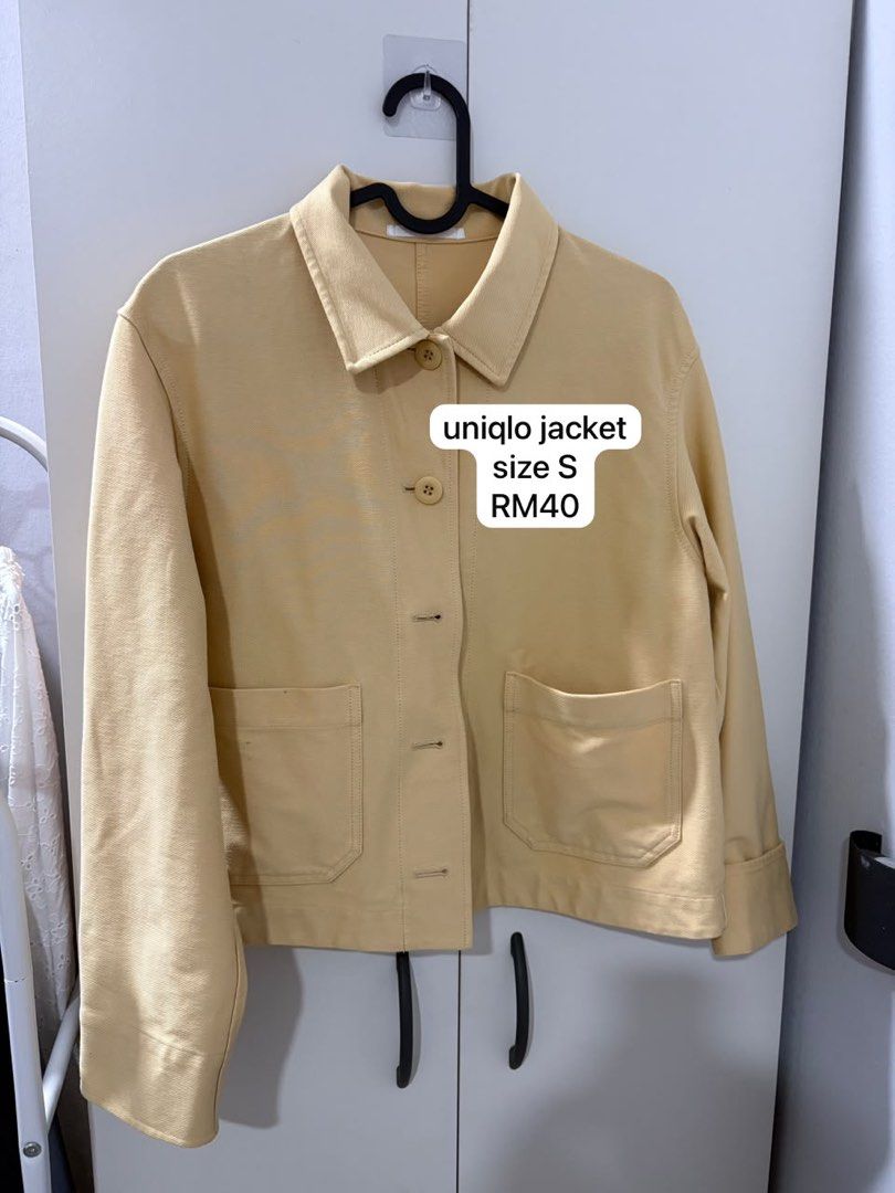 Uniqlo jacket - yellow (Category: Coats, Jackets and Outerwear) located in Subang Jaya. Submitted by zawaniadrs (Listing ID 1446495132, Image 1). Description: Ada specks of stain. Size S.