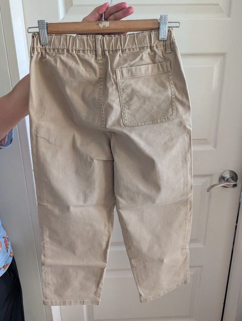 Uniqlo Kids Pants Size 140 (Category: Babies & Kids Fashion) located in Manila. Submitted by cart_rd (Listing ID 1446366379, Image 2). Description: - Uniqlo Kids Pants - Color: Light Khaki - Size: 140 - Features: Elastic waistband for comfort - Condition: Small stain on the back pocket area (refer to last photo for detail) - Ideal for: Everyday wear.