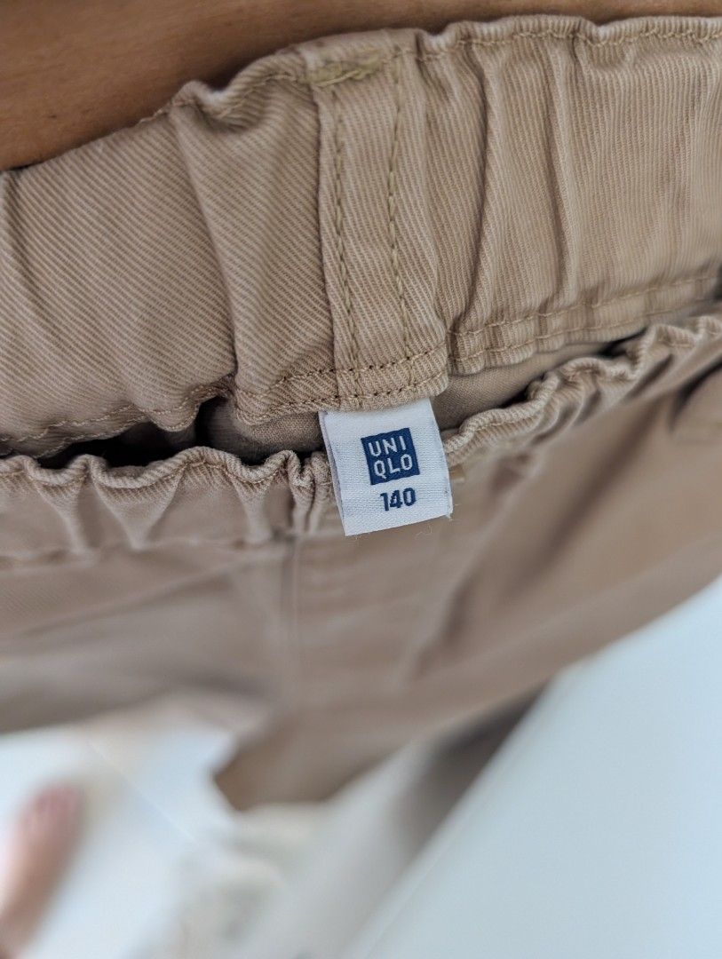 Uniqlo Kids Pants Size 140 (Category: Babies & Kids Fashion) located in Manila. Submitted by cart_rd (Listing ID 1446366379, Image 3). Description: - Uniqlo Kids Pants - Color: Light Khaki - Size: 140 - Features: Elastic waistband for comfort - Condition: Small stain on the back pocket area (refer to last photo for detail) - Ideal for: Everyday wear.