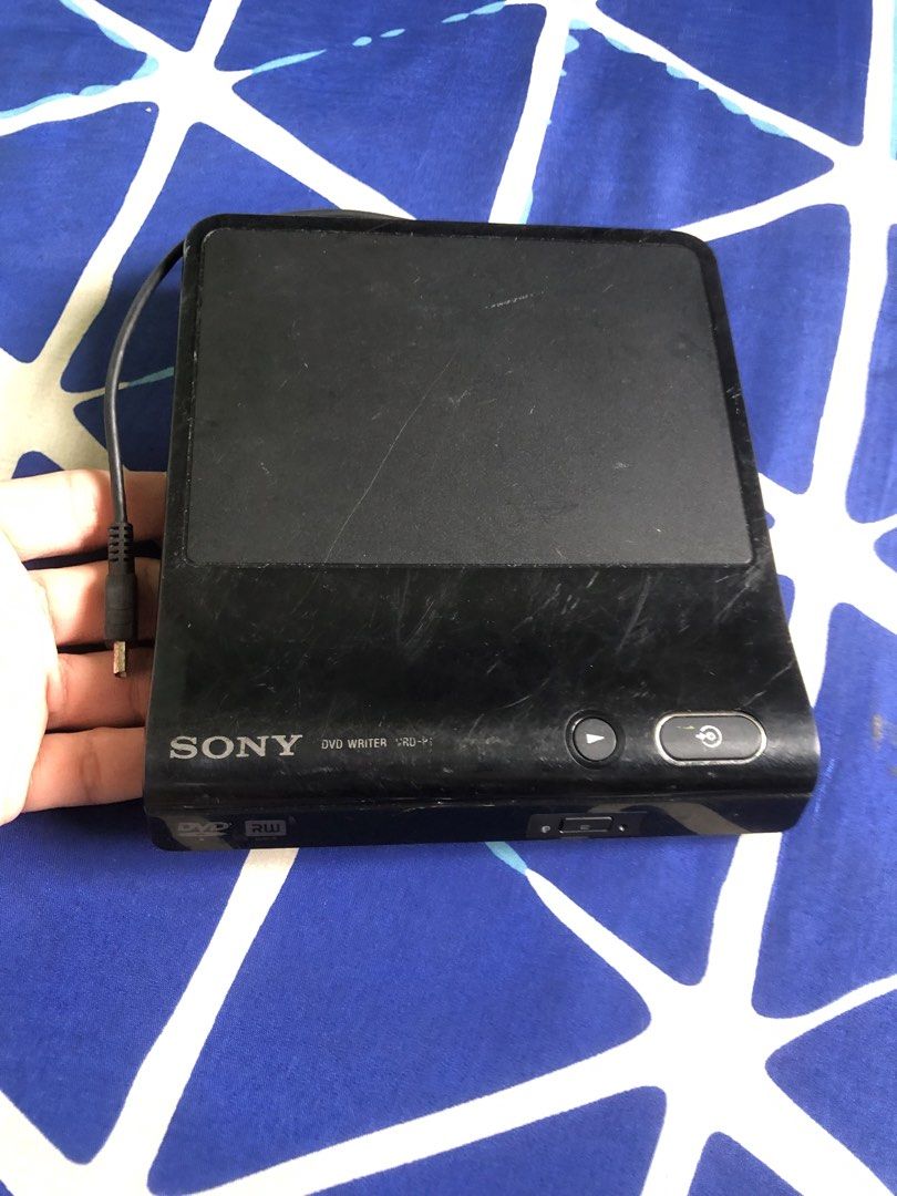 Untested Sony DVD RW drive (Category: Portable Audio Accessories) located in Quezon City. Submitted by markgolveo (Listing ID 1446380052, Image 2). Description: Untested Sony DVD RW drive Signs of body wears on shell case Untested as declared Usb cable end is uncommon For parts out repairs.