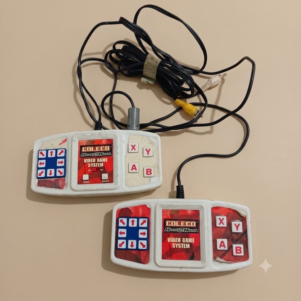 Vintage Coleco Head-to-Head Video Game System (Untested) (Category: Nintendo) located in Quezon City. Submitted by lem1998 (Listing ID 1446510026, Image 1). Description: Description ​Up for sale is a vintage Coleco Head-to-Head Video Game System handheld console set. This classic dual-controller system allows for two-player retro gaming directly on your television. ​What's Included: ​Player 1 & Player 2 Controllers: Built-in connecting cables wit