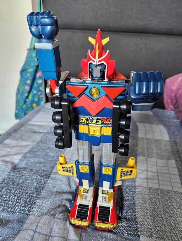 Vintage Popy DX Voltes V Diecast Robot (Category: Vintage Collectibles) located in Caloocan City. Submitted by banshee8818 (Listing ID 1446453086, Image 2). Description: - Original 1970s DX Popy Voltes V diecast robot. 3D prints or repros - with all accessories - Includes original bottom box and styrofoam insert. Top cover not included - Robot disassembles into component vehicles - Shows paint wear on robot and accessories - A must-have for colle