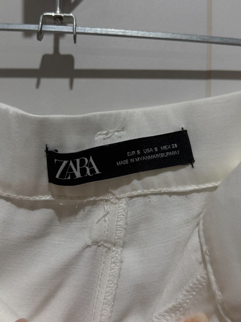 White Cargo Pants with Buckle Detail (Category: Other Bottoms) located in Mandaluyong City. Submitted by kayechx (Listing ID 1446495983, Image 2). Description: - White cargo pants - Buckle details on side pockets - Belt loops at waist - Two back pockets, two side pockets - Straight leg fit - Ideal for casual wear - price SLIGHTLY negotiable, but not by a lot huhu already selling cheap since i need closet space asap will give 10% discount if you b