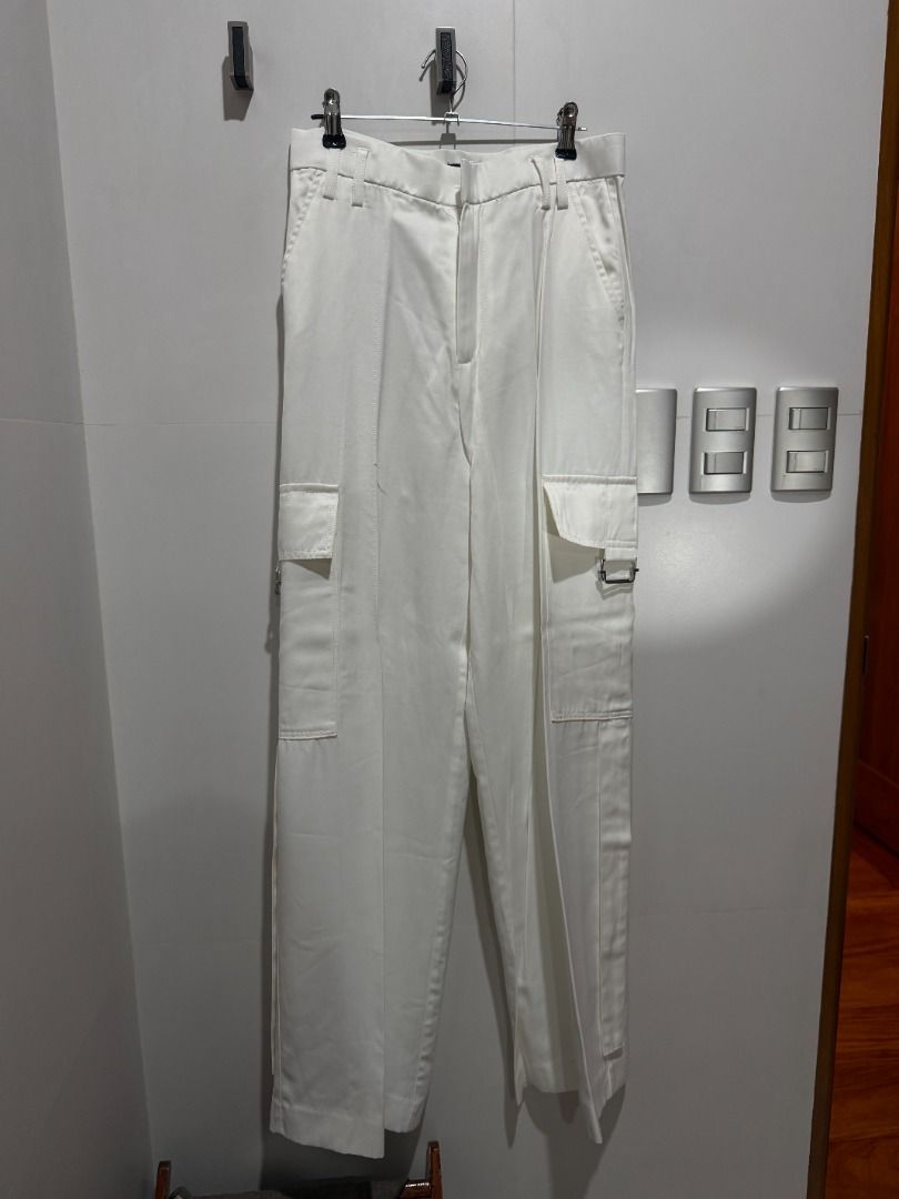 White Cargo Pants with Buckle Detail (Category: Other Bottoms) located in Mandaluyong City. Submitted by kayechx (Listing ID 1446495983, Image 1). Description: - White cargo pants - Buckle details on side pockets - Belt loops at waist - Two back pockets, two side pockets - Straight leg fit - Ideal for casual wear - price SLIGHTLY negotiable, but not by a lot huhu already selling cheap since i need closet space asap will give 10% discount if you b
