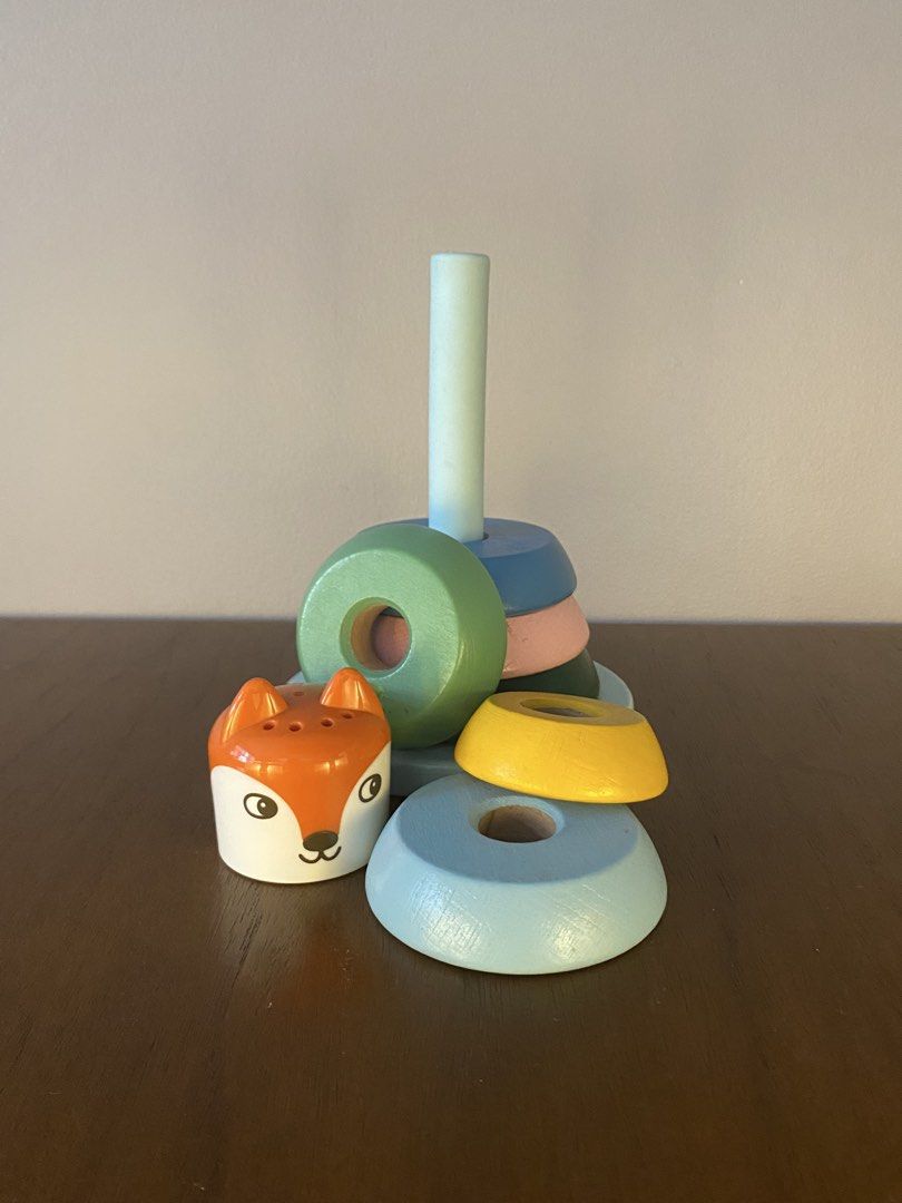 Wooden Fox Stacking Rings Toy (Category: Educational & Learning Toys) located in Paranaque City. Submitted by abrilalvin (Listing ID 1446409053, Image 2). Description: - Adorable wooden stacking toy featuring a cute fox head. - Includes brightly colored rings of varying sizes. - Encourages early learning of stacking and sorting skills. - Rings stack onto a central peg. - The fox head serves as the fun topper. - Perfect engaging toy for toddlers..
