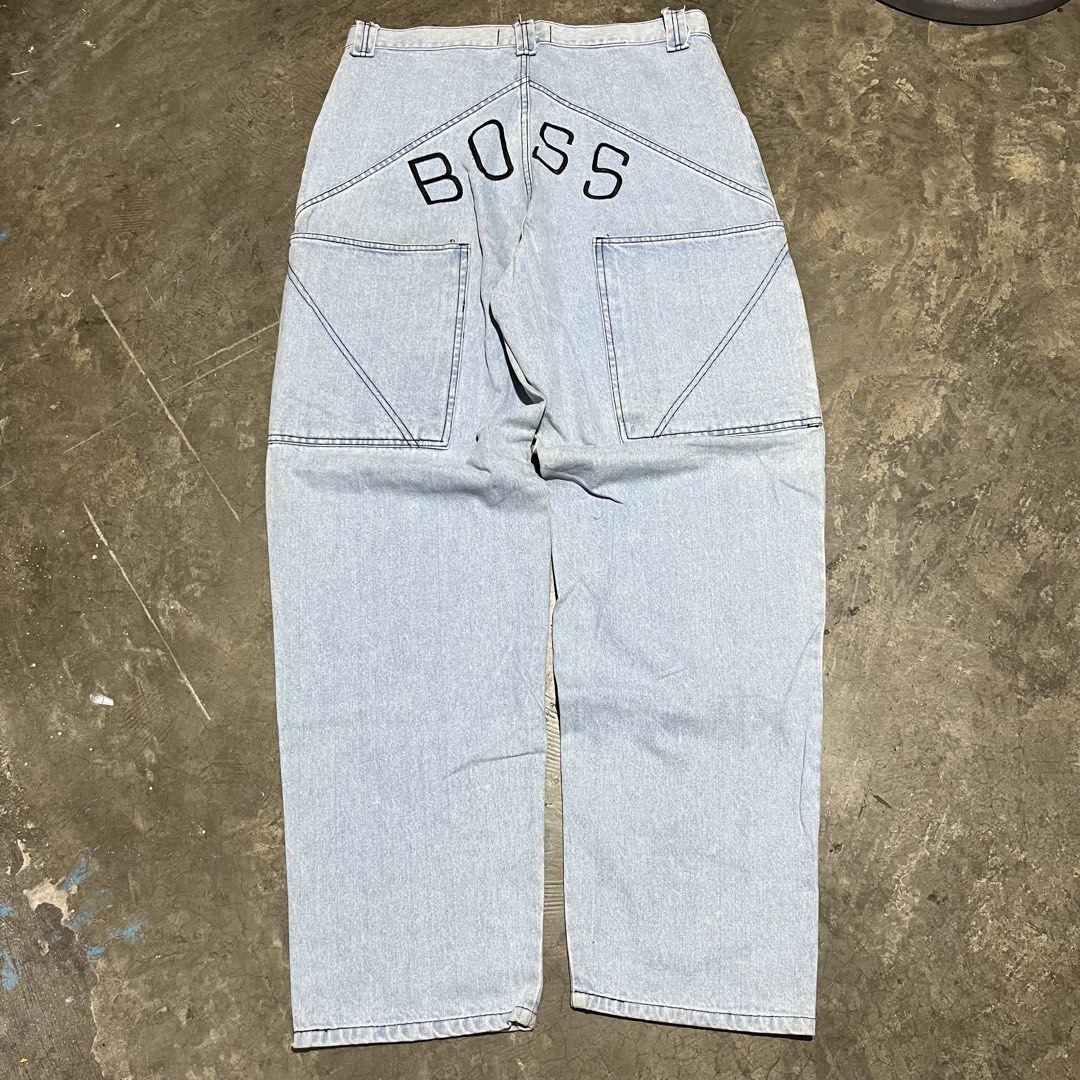 Y2k BOSS Script Embroidered Deep Pocket JNCO style jeans (Category: Jeans) located in Marikina City. Submitted by wayupcollective (Listing ID 1446531170, Image 1). Description: Y2k BOSS Script Embroidered Deep Pocket JNCO style jeans Size 38 Excellent condition Signs of usage Dimensions Waist: 38” Crotch: 17” Inseam: 34” Thigh: 14.5” Knee: 12” Leg opening: 9.5” Length: 49”.