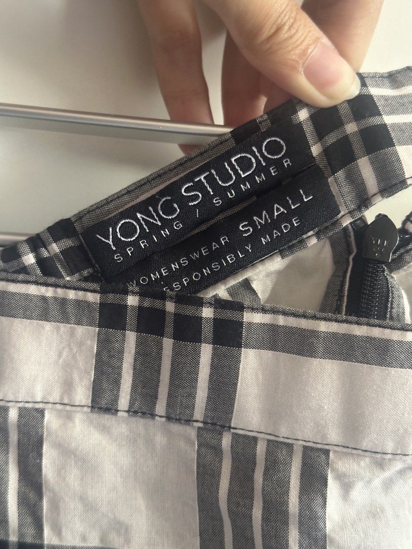 [Yong Studio] Malia Skirt in Black Checkered (Category: Skirts) located in Manila. Submitted by miumusee (Listing ID 1446526236, Image 3). Description: •RFS:decluttering, I don’t really reach for this as much as I’d like •Retails for ₱4,699 •still looks brand new just needs ironing •payment through gcash only •shipping will be shouldered by the buyer other details: - Zipper closure at the back - Versatile for casual or dressed-up looks.