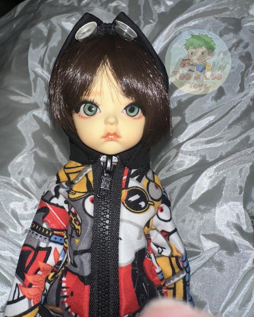 YOSD BJD from Gem of Doll (Authentic) (Category: Figurines & Statues) located in Quezon City. Submitted by tandltoys (Listing ID 1446478063, Image 1). Description: A Beautiful YOSD Ball-Jointed Doll (BJD) from Gem of Doll. - Striking green eyes with detailed makeup - Comes with two wigs: one brown, one silver - Includes several outfits as pictured, including 7 pair of shoes and 1 slippers. - Also includes additional hands and another pair of eyes