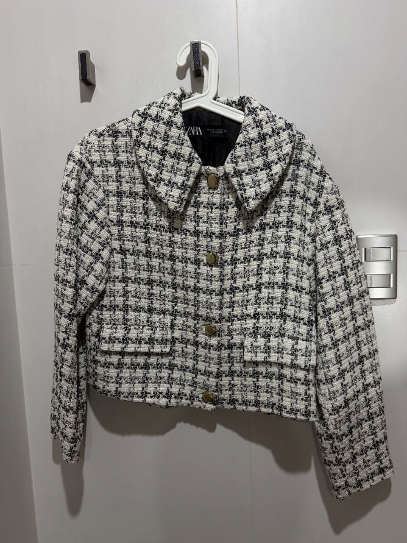 Zara Tweed Cropped Jacket (Category: Coats, Jackets and Outerwear) located in Mandaluyong City. Submitted by kayechx (Listing ID 1446497023, Image 1). Description: - Zara cropped jacket - Classic black and white tweed pattern - Rounded collar - Gold button details - Two front pockets - Perfect for dressing up or down - Ideal for layering - price SLIGHTLY negotiable, but not by a lot huhu already selling cheap since i need closet space asap will g