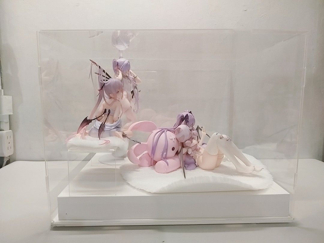 Acrylic Display Case Box for Figures (Category: Storage Boxes & Baskets) located in Manila. Submitted by anythinggoesshop (Listing ID 1446628018, Image 2). Description: - Clear acrylic display case - Dimensions: 40cm (L) x 30cm (W) x 30cm (H) - Ideal for showcasing collectibles, figures, and models - white base - Easy to assemble selling low due to dented base, some broken edges due to shipping from overseas (china), acrylic case still have films