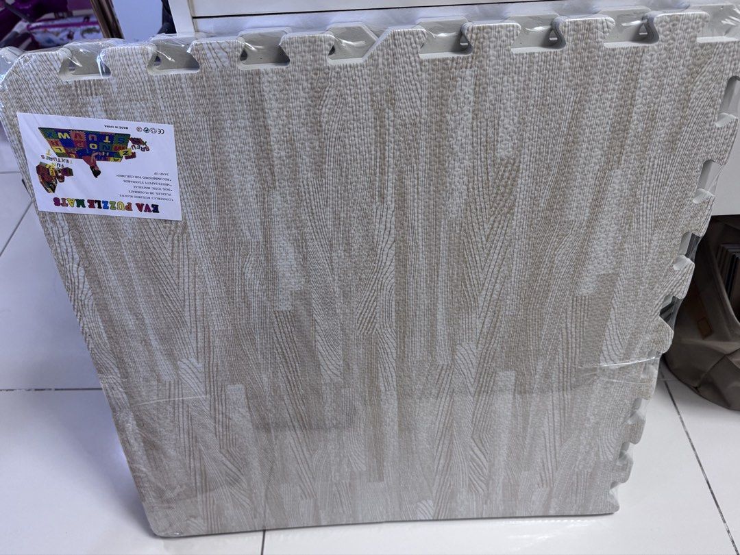 4pcs Puzzle Mat (Category: Carpets, Mats & Flooring) located in Taguig. Submitted by dezellaine (Listing ID 1446697615, Image 1). Description: Brand new wood print design EVA puzzle mats 300 for 4pcs Rfs: extra.