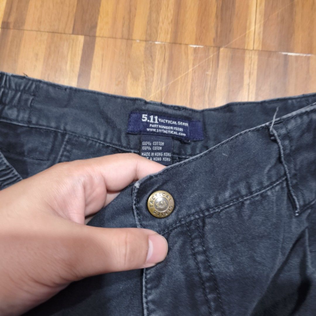 5.11 Tactical Series Cargo Shorts (Category: Shorts) located in Paranaque City. Submitted by bella0712 (Listing ID 1446563050, Image 2). Description: - Brand: 5.11 Tactical - Color: Dark Navy Blue - Material: 100% Cotton - Features: Multiple storage pockets, elastic waistband for comfort - Size: 32x19 - Ideal for: Outdoor activities, casual wear.