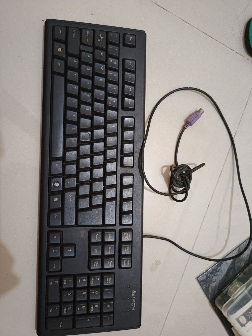 A4Tech PS/2 Keyboard with Numeric Keypad (Category: Computer Keyboard) located in Manila. Submitted by alfonsopre35042 (Listing ID 1446600670, Image 1). Description: - Black A4Tech keyboard - Full numeric keypad - PS/2 connection - Cable is a bit tangled - Some dust on keys - untested working before mastock na lng for years RFS: declutter and need funds for my cats and my medication ‎ ‎payment via gcash or thru UnionBank.