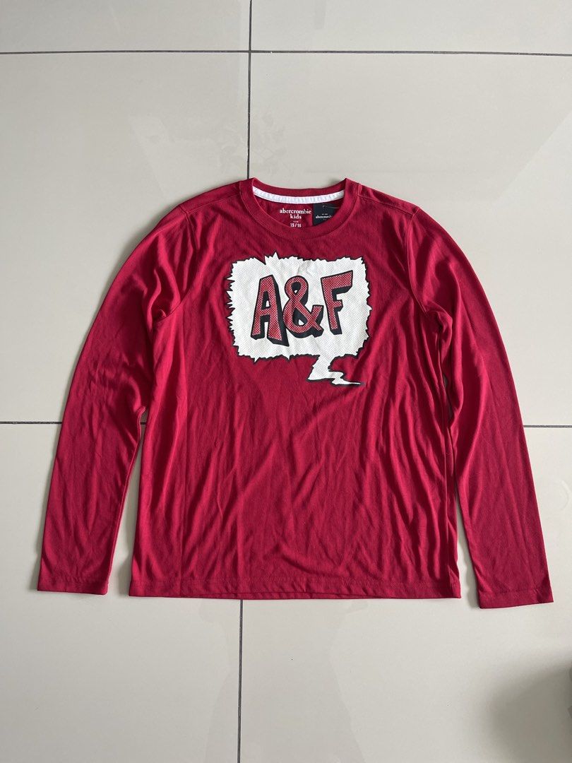 Abercrombie Kids Red A&F Long Sleeve Shirt & Patterned Pants Set (Category: Babies & Kids Fashion) located in Kuala Lumpur. Submitted by legitseller_cheras (Listing ID 1446597603, Image 2). Description: - brand new - Abercrombie Kids long sleeve t-shirt - Red color with A&F graphic - Matching patterned pajama pants included - Pants have a red waistband with 'abercrombie' logo - Size: 15/16 - Ideal for comfortable lounging - Bought it from NYC ALM