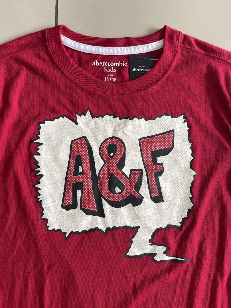 Abercrombie Kids Red A&F Long Sleeve Shirt & Patterned Pants Set (Category: Babies & Kids Fashion) located in Kuala Lumpur. Submitted by legitseller_cheras (Listing ID 1446597603, Image 3). Description: - brand new - Abercrombie Kids long sleeve t-shirt - Red color with A&F graphic - Matching patterned pajama pants included - Pants have a red waistband with 'abercrombie' logo - Size: 15/16 - Ideal for comfortable lounging - Bought it from NYC ALM