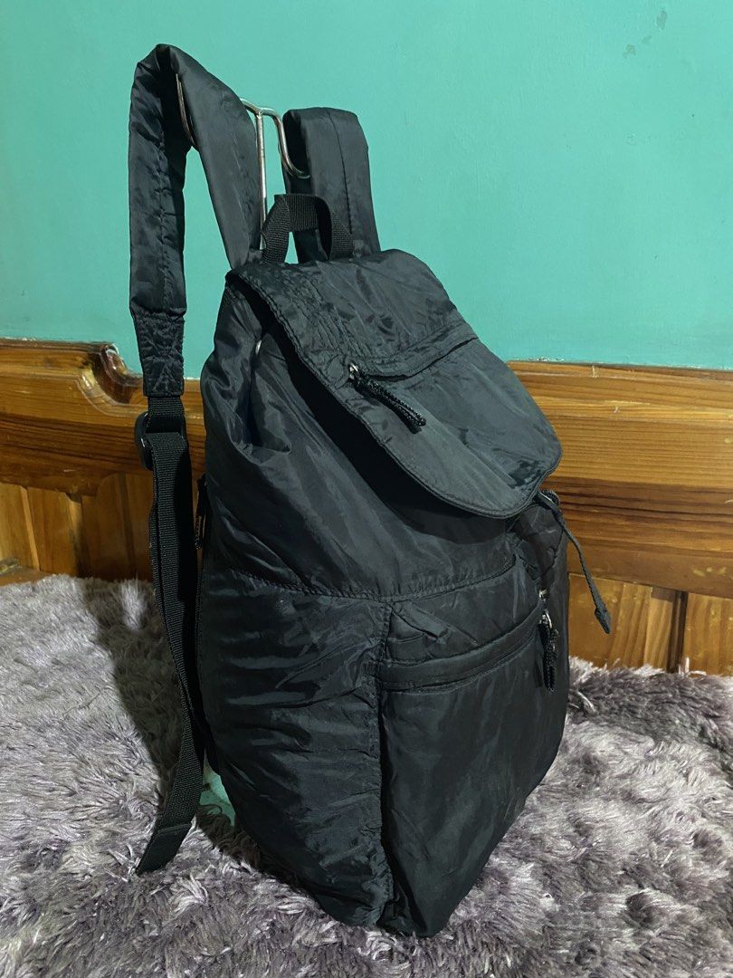 Adidas Black Nylon Drawstring Backpack (Category: Backpacks) located in La Trinidad. Submitted by kinleyky (Listing ID 1446661413, Image 2). Description: - Classic black Adidas backpack - Secure drawstring closure under a flap - Multiple convenient zip pockets on the front - Comfortable padded shoulder straps - Ideal for everyday use or travel - Iconic Adidas logo prominently displayed on the front.