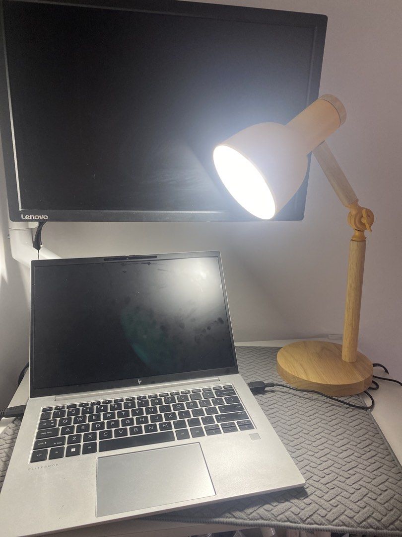 Adjustable Desk Lamp with Wooden Base - Yellow (Category: Lighting) located in Taguig. Submitted by ceej0915 (Listing ID 1446626276, Image 1). Description: - Bright yellow desk lamp - Sturdy wooden base - Adjustable arm for perfect lighting - Excellent working condition - Includes power cord - Perfect for study desks or bedside tables.