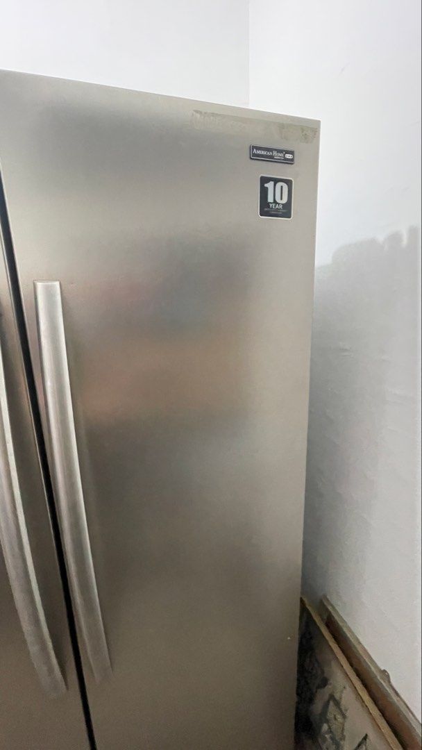 American Home Side-by-Side Inverter Refrigerator (Category: Refrigerators and Freezers) located in General Trias. Submitted by vb_824 (Listing ID 1446676919, Image 1). Description: 📍Lancaster, General Trias Honest Issue: - Dents - Nagamit na ang warranty. ( Compressor replaced ).