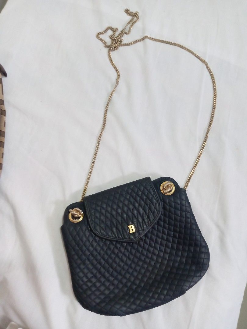 Bally Quilted Black Leather Chain Shoulder Bag (Category: Luxury Bags & Wallets) located in Manila. Submitted by _skybagph (Listing ID 1446579710, Image 1). Description: - Classic black quilted leather shoulder bag - Elegant gold chain strap - Features iconic Bally 'B' logo on front flap - Versatile for casual or evening wear.