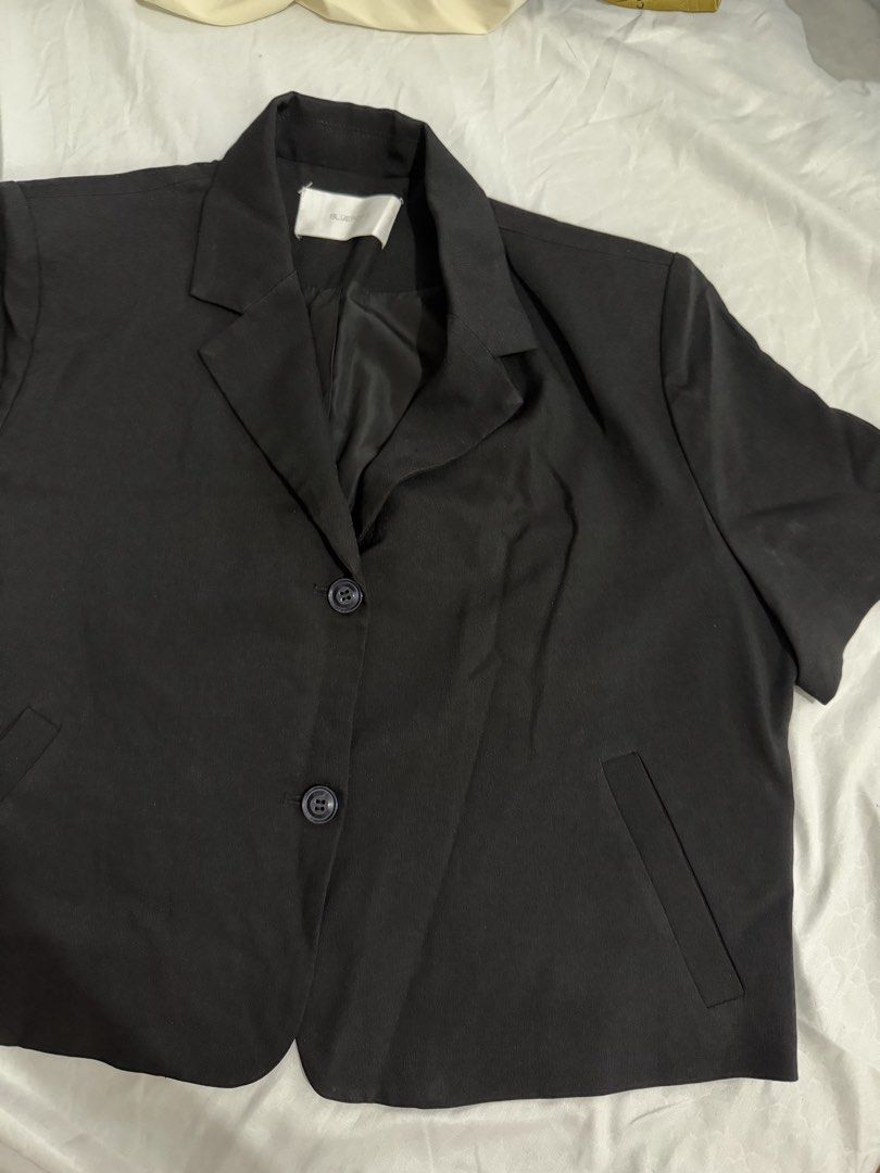 Black Short Sleeve Cropped Blazer (Category: Coats, Jackets and Outerwear) located in Quezon City. Submitted by jdmc16 (Listing ID 1446609122, Image 1). Description: - Black cropped blazer - Short sleeves - Two-button front closure - Two flap pockets - Estimated size: M or L - Measurements: Approx. 20" chest, 19" length - Note: Small mark on sleeve.