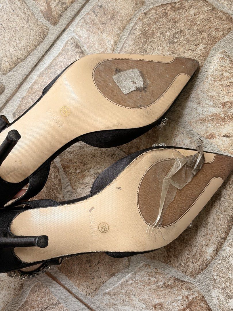 Black Slingback Heels with Rhinestone Embellishments (Category: Heels) located in Manila. Submitted by bratrcm (Listing ID 1446656197, Image 2). Description: - Elegant black slingback heels - Chic pointed toe design - Dazzling rhinestone embellishments on straps and front - Comfortable moderate heel height - Soles show minor wear, with protective plastic still attached in some areas - Ideal for parties, events, or elevating any outfit EU 38 - bes