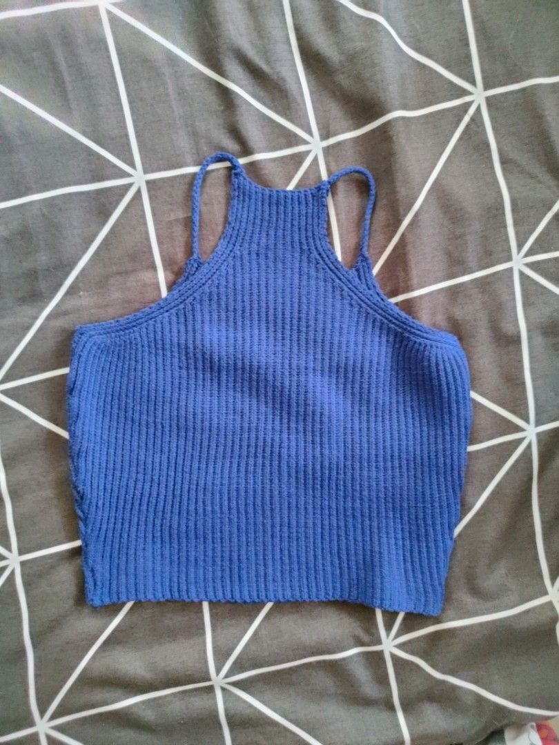 Blue Ribbed Knit Crop Top with Spaghetti Straps (Category: Sleeveless) located in Manila. Submitted by thatstyle (Listing ID 1446553128, Image 2). Description: - Cute blue ribbed knit crop top - Features thin spaghetti straps - Stretchy and comfortable material - Versatile for layering or wearing on - used to be my fave top, but won't fit already huhu - Pairs well with high-waisted jeans or skirts - Easy to style for casual or dressed-up occasion