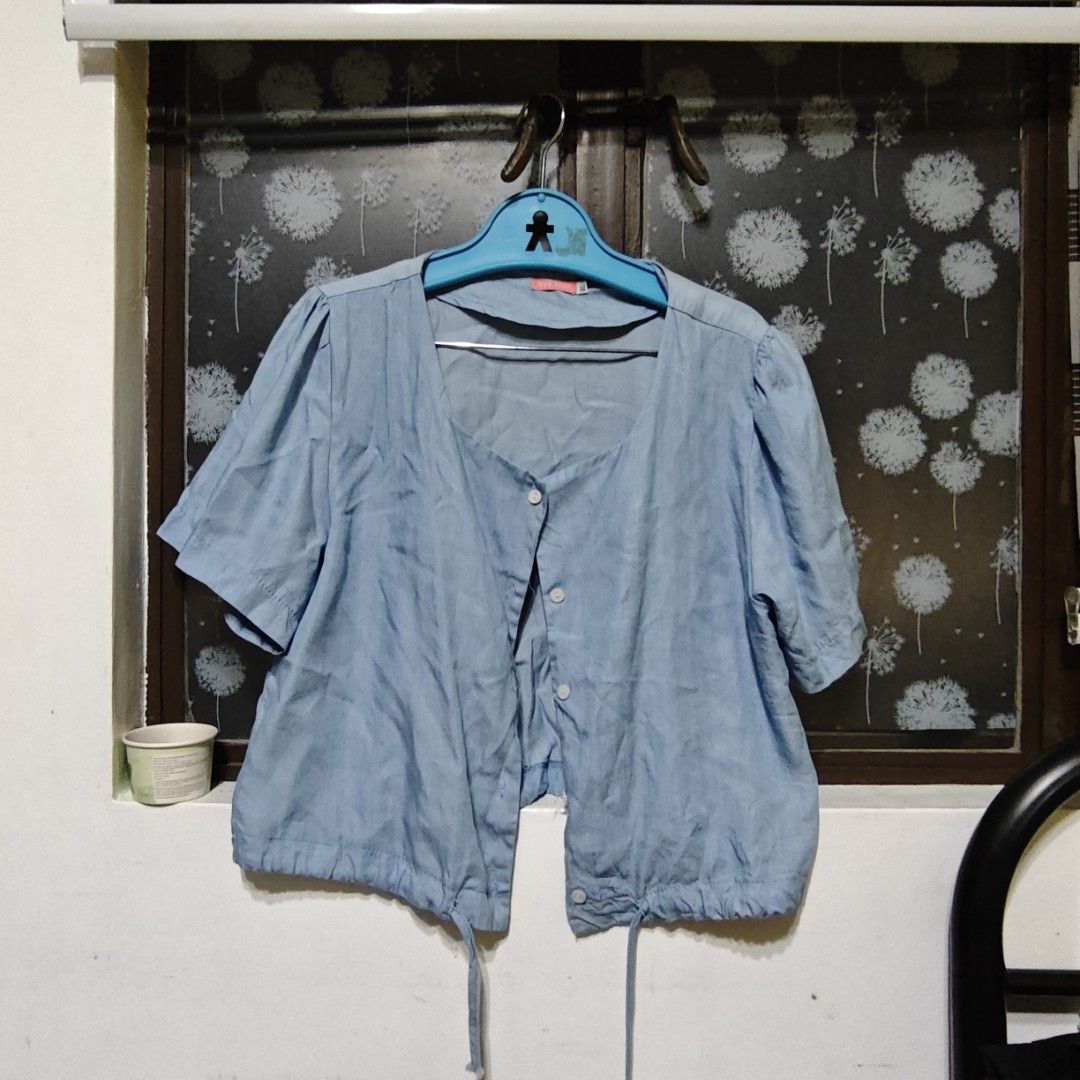 Bobson Blue Puff Sleeve Button Up Top (Category: Blouses) located in Manila. Submitted by eeb0101 (Listing ID 1446651878, Image 1). Description: - Brand: Bobson - Color: Light blue - Style: Button-up top - Sleeves: Short puff sleeves - Hem: Drawstring - Estimated Size: L - Occasion: Casual wear.