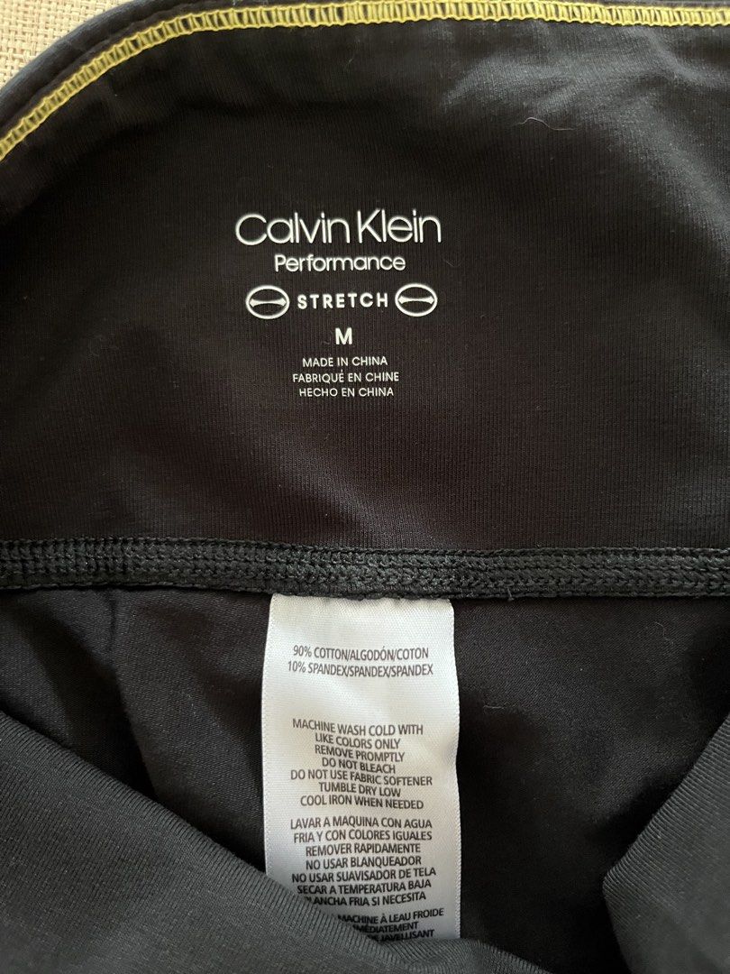 Calvin Klein Performance Premium Double Waistband Size M (Category: Activewear) located in Marikina City. Submitted by taylorm31 (Listing ID 1446612343, Image 3). Description: - Black Calvin Klein Performance leggings - White branded taping down the sides - Made with comfortable stretch fabric - Double Waistband - Ideal for workouts or casual wear - Size Medium - Length 33.25" - With tag - Retail Ph3,800 ( selling 1,800 ) .