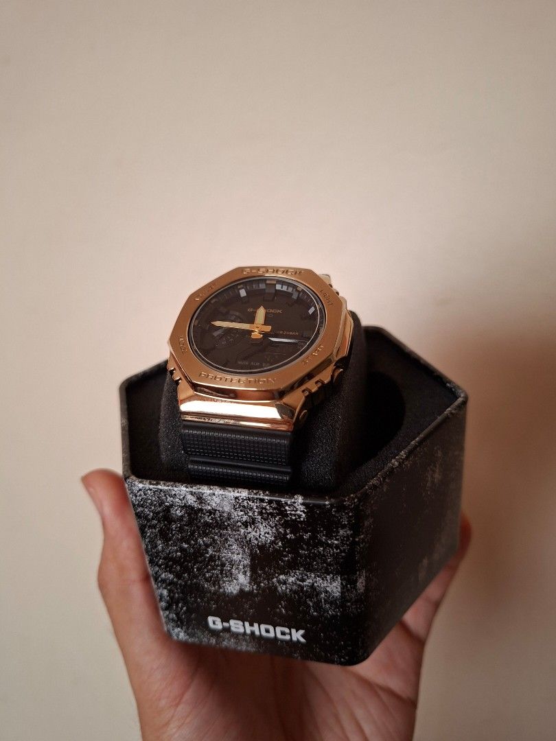 Casio G-Shock GA-2100G (Casioak) Gold Watch (Category: Men's Watches) located in Makati City. Submitted by rayluzuriaga (Listing ID 1446567792, Image 1). Description: Casio G-Shock (GA-2100G) Premium Metal Bezel Series - Gold Metal Bezel (44.4mm); Black Strap - Classic octagonal bezel (Casioak Style) - Digital and analog display - Already has a tempered glass protector installed. - Complete; Includes original box and tin container, manual, local 