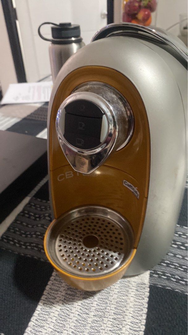 CBTL Caffitaly Coffee Machine with Capsule Holder (Category: Coffee Machines & Makers) located in Manila. Submitted by softwood (Listing ID 1446648157, Image 3). Description: CBTL coffee machine. Comes with a capsule holder filled with various coffee and tea capsules. Great for your morning brew. Easy to use. Some capsules are opened, some are sealed. Selling as a set..