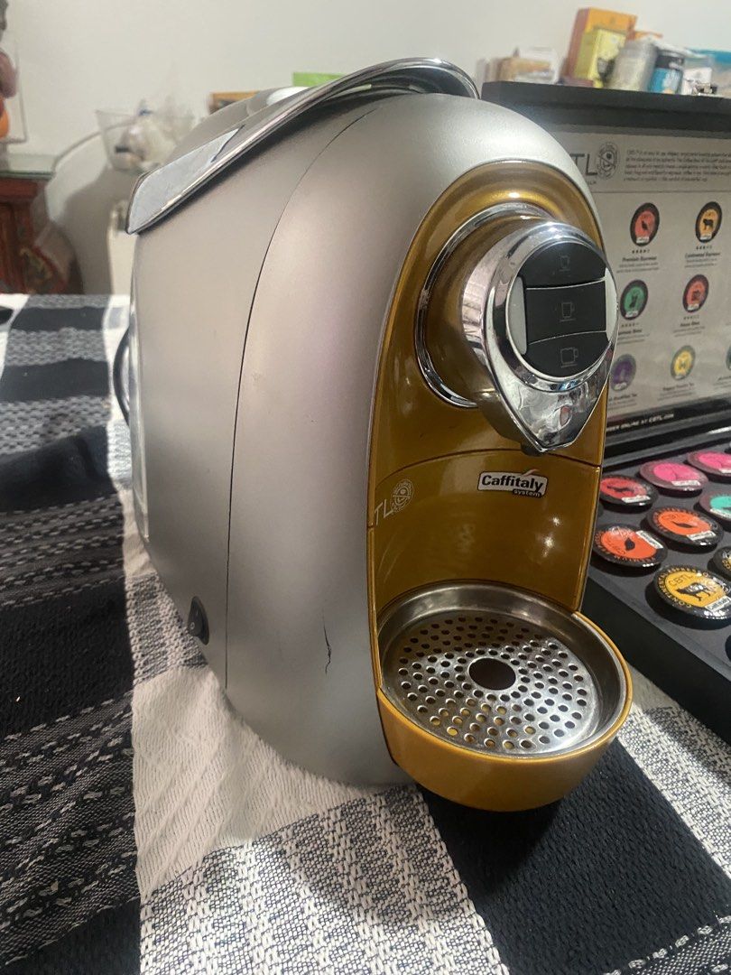 CBTL Caffitaly Coffee Machine with Capsule Holder (Category: Coffee Machines & Makers) located in Manila. Submitted by softwood (Listing ID 1446648157, Image 2). Description: CBTL coffee machine. Comes with a capsule holder filled with various coffee and tea capsules. Great for your morning brew. Easy to use. Some capsules are opened, some are sealed. Selling as a set..