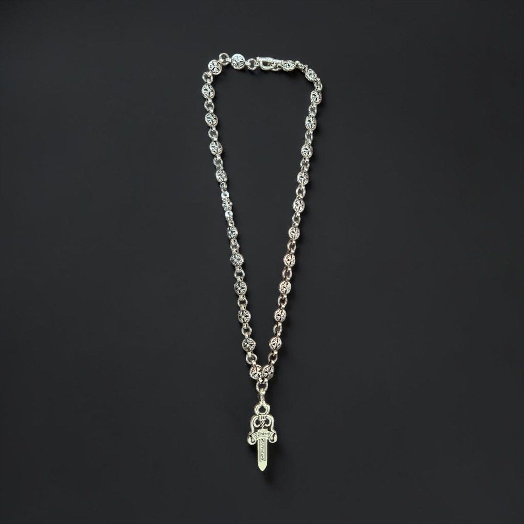 Chrome Hearts Dagger Pendant Necklace Silver (Category: Luxury Accessories) located in Angeles City. Submitted by curationn1 (Listing ID 1446580357, Image 2). Description: -Chrome Hearts dagger pendant necklace - Silver chain adorned with dagger charm - Comes with packaging: box, dust bag, and polishing cloth - A stylish and essential accessory.