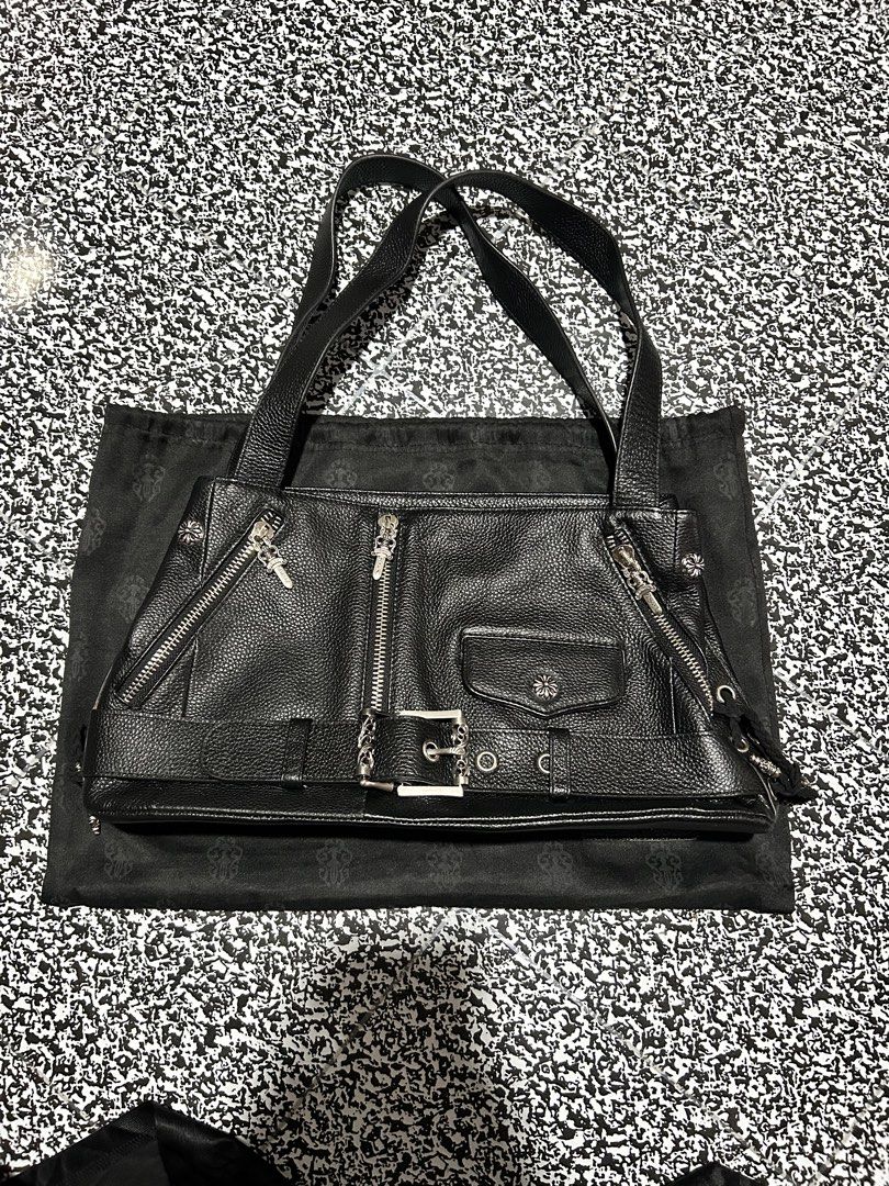 Chrome Hearts jj dean bag (Category: Luxury Bags & Wallets) located in Manila. Submitted by heritage_thrift (Listing ID 1446632494, Image 1). Description: - Genuine Chrome Hearts black leather tote bag - Multiple zippered pockets for organization - Stylish buckle detail on the front - Subtle Chrome Hearts logo plate on the back - Comes with original dust bag - Ideal for everyday carry and versatile use.