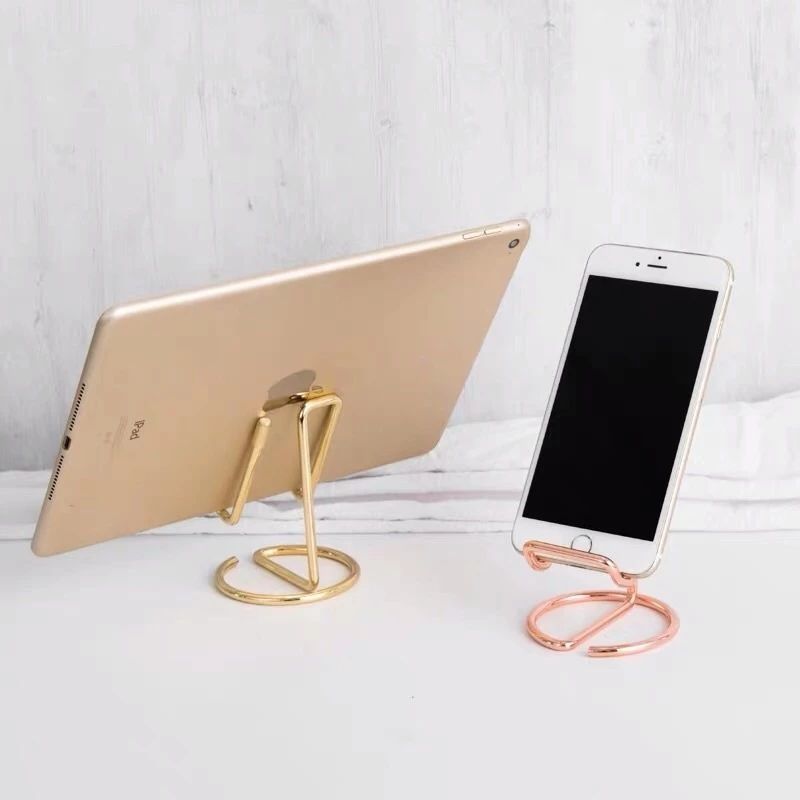 Classy Iron Abstract Phone & Tablet Holder Stand (Category: Mounts & Holders) located in Manila. Submitted by cristytah (Listing ID 1446547877, Image 1). Description: Price: ₱249/pc 📱✨ Classy Iron Abstract Phone & Tablet Holder Stand Upgrade your workspace with this sleek and modern metal stand, designed to keep your phone or tablet securely in place while adding a touch of elegance to your desk or countertop. ✨ On-hand & ready to ship ✨ Availab