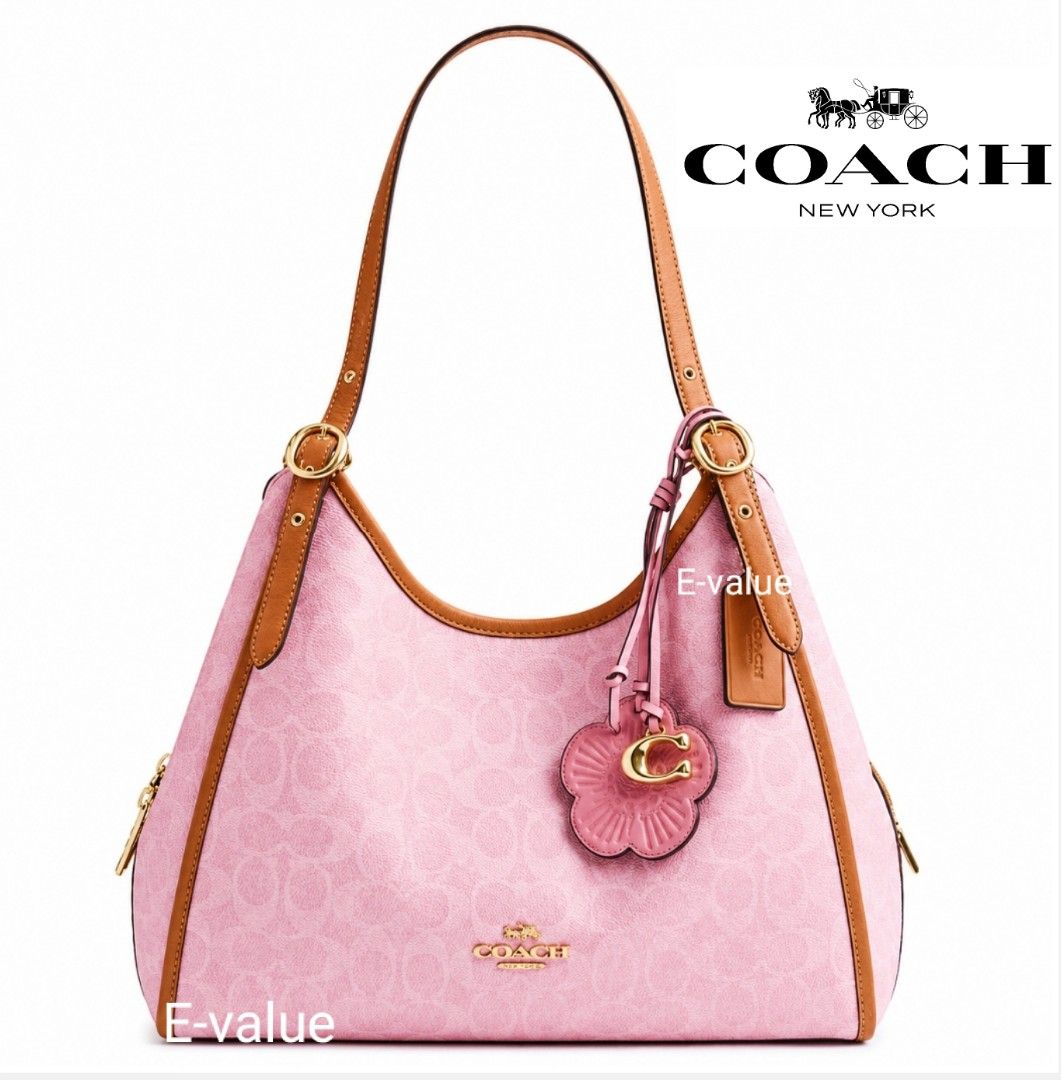 Coach Original Signature Powder Pink With Flora Charm Limited Edition Erin Shoulder Bag For Women Come With Complete Set Suitable For Gift (Category: Shoulder Bags) located in Kuala Lumpur. Submitted by evalue_tech_enterprise (Listing ID 1446699922, Image 1). Description: ✅Measurements Length: 12.25" Height: 10.25" Width: 5.5" Materials Signature coated canvas, smooth leather and vachetta leather Recycled polyester lining Handle Adjustable handle