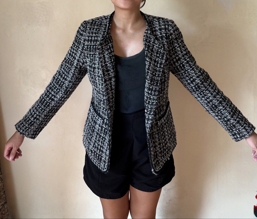 COATSMNL Black & White Tweed Cropped Jacket (Category: Coats, Jackets and Outerwear) located in Caloocan City. Submitted by _declutterbym (Listing ID 1446108788, Image 3). Description: - Size: SMALL - NEVER BEEN USED SINCE BOUGHT - Classic black and white tweed cropped jacket - Textured weave for a sophisticated look - Decorative trim along edges and pockets - Collarless design - Perfect for pairing with skirts or trousers - Ideal for layering to