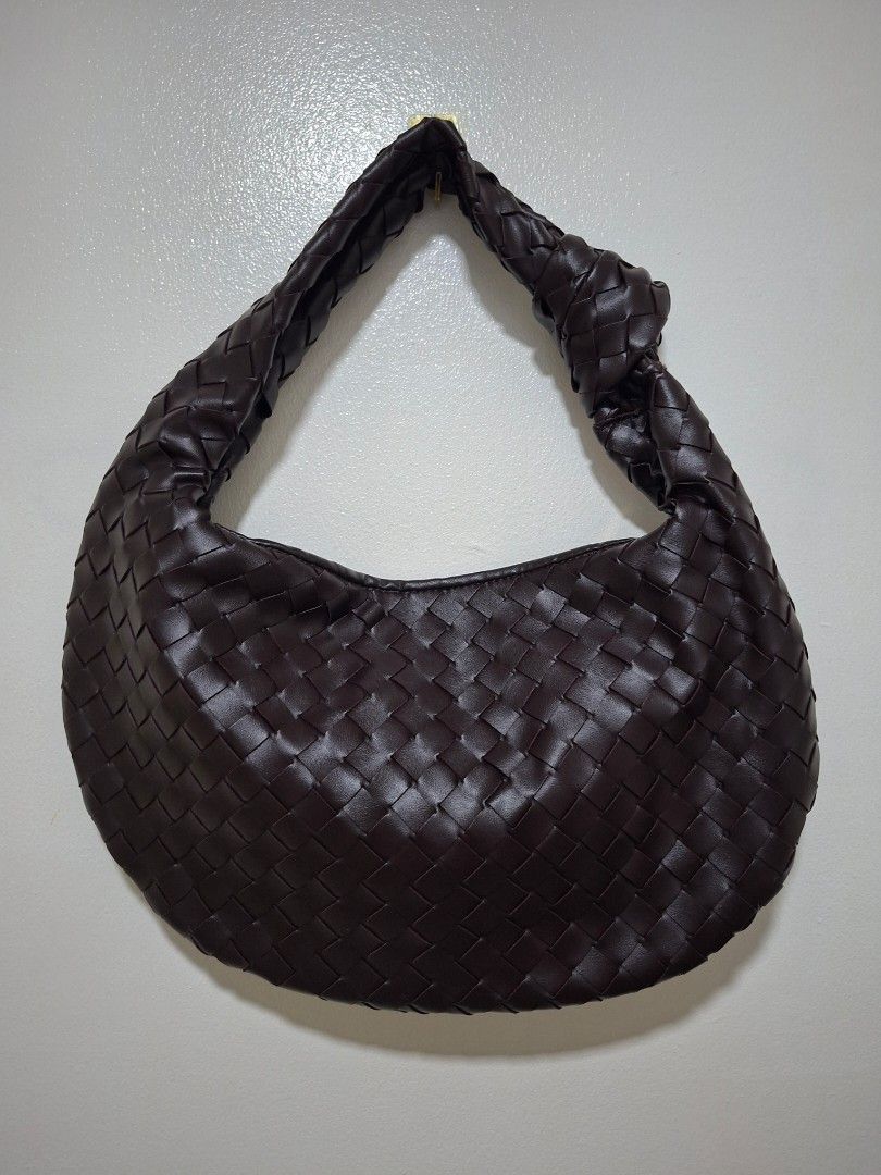 Dark Brown Woven Leather Hobo Bag (Category: Shoulder Bags) located in Cabanatuan. Submitted by riworks (Listing ID 1446635696, Image 1). Description: - Dark brown woven leather hobo bag - Unique knotted strap design - Secure zipper closure - Spacious interior, great for everyday essentials - Check photos for detailed condition.