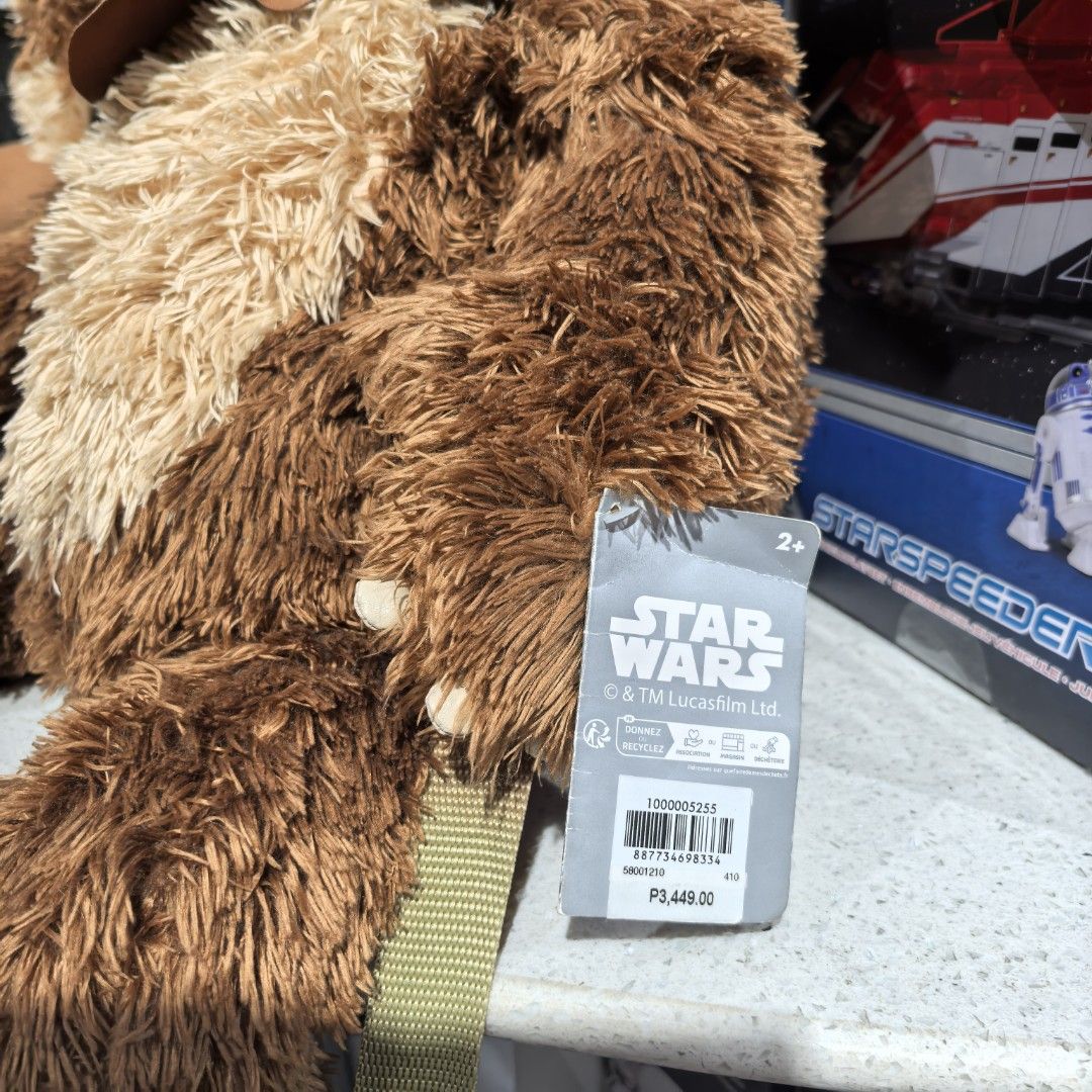Disney store Star Wars Ewok Plush Backpack (Category: Plushies & Soft Toys) located in Pasay City. Submitted by declutteringmomshi (Listing ID 1446552213, Image 2). Description: - Super cute Ewok plush backpack from Star Wars. - Perfect for any Star Wars fan! - Features adjustable straps for a comfortable fit. - Ideal for carrying your everyday essentials. - A fun and unique accessory..
