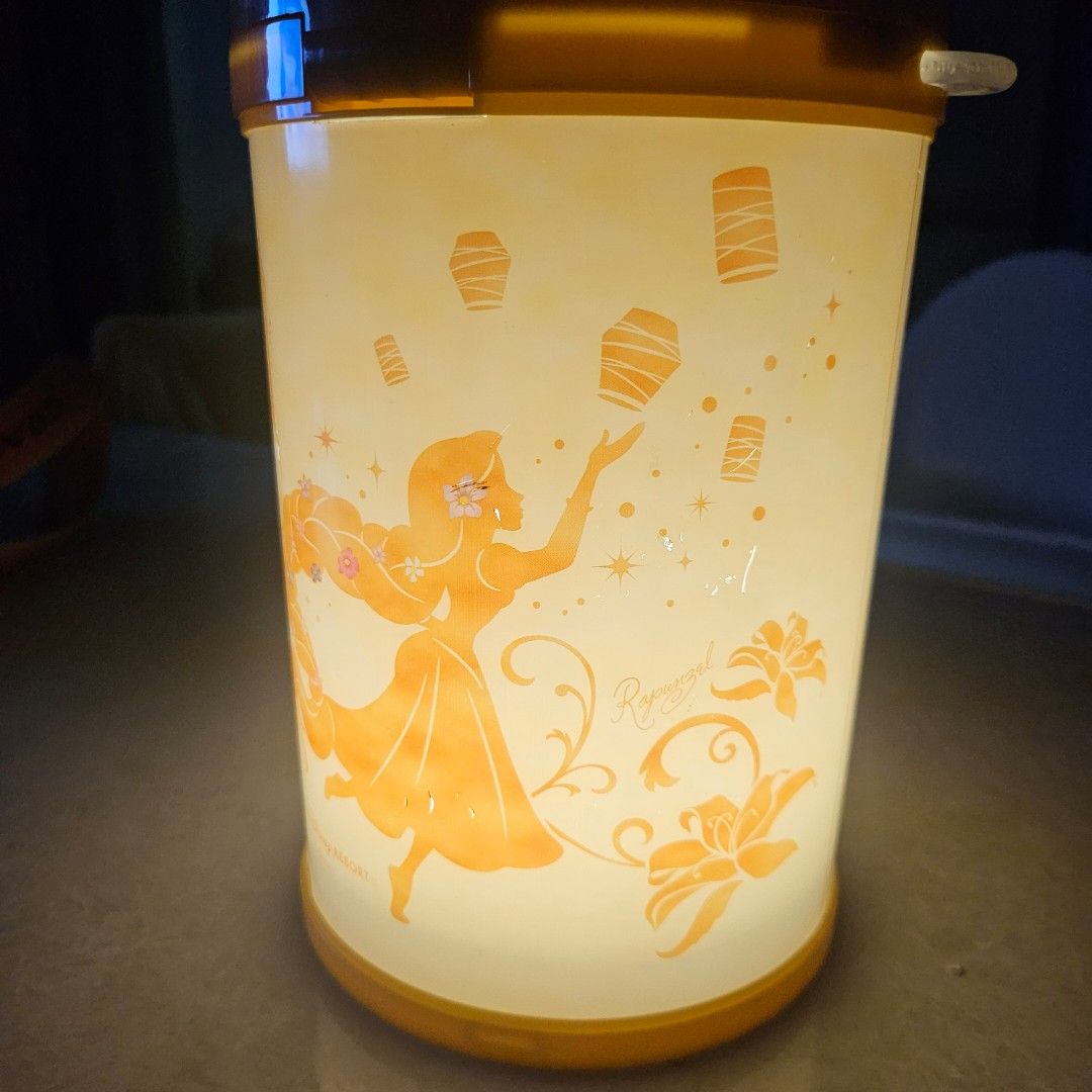 Disney Tangled popcorn bucket (Category: Lighting) located in Manila. Submitted by mystar0411 (Listing ID 1446648177, Image 1). Description: - Disney Tangled themed lantern lamp - Features Rapunzel and iconic floating lanterns - Orange and yellow color scheme - Inspired by Tokyo Disney Resort - Ideal gift for Disney fans or room decor.